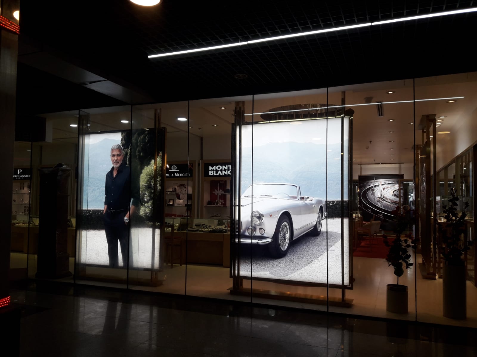 A watch movement being assembled by a watchmaker.